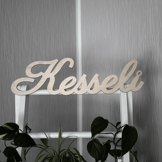 Kaunokirjoitettu ja kursivoitu tekstikyltti